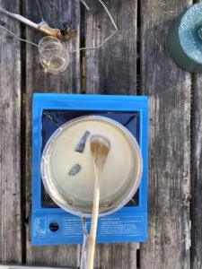 Stirring jalapeño cream sauce in a saucepan