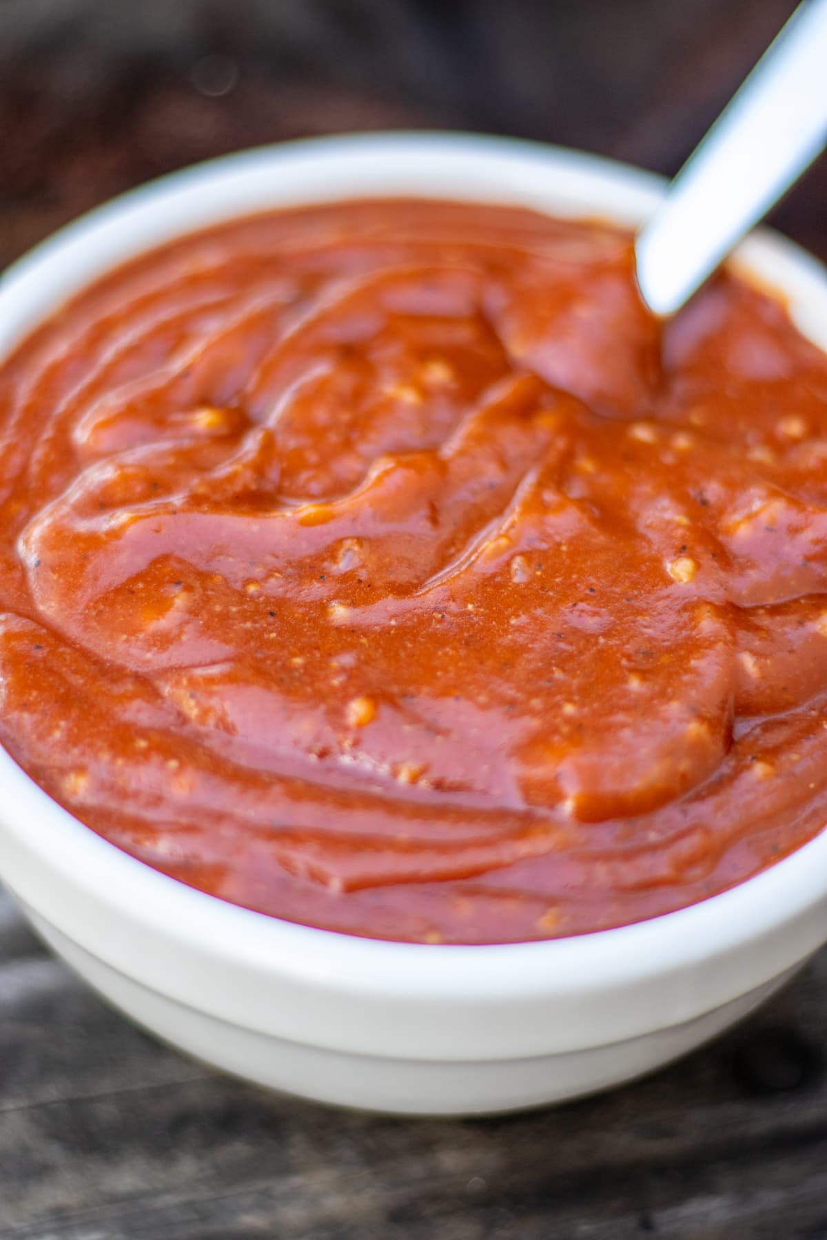 Close up of BBQ sauce in a white bowl