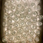 Empty advent bottles in the kitchen sink