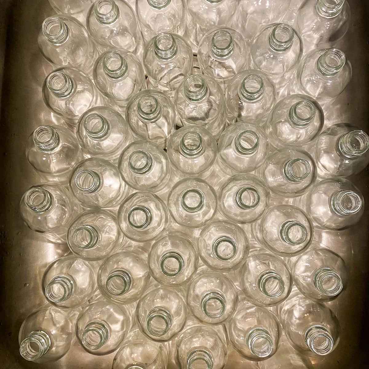 Empty advent bottles in the kitchen sink