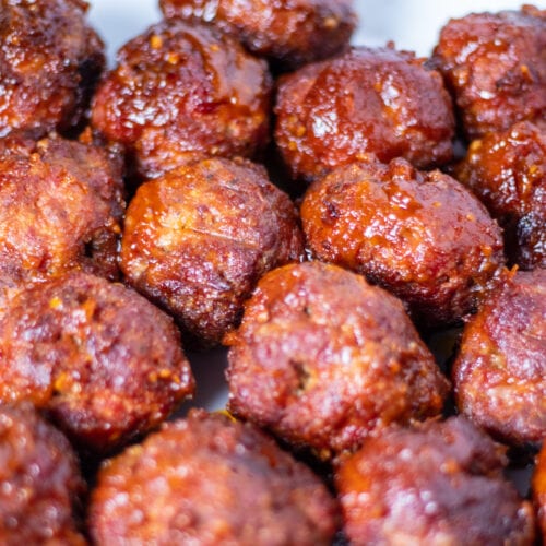 Close up of meatballs cooked in BBQ sauce