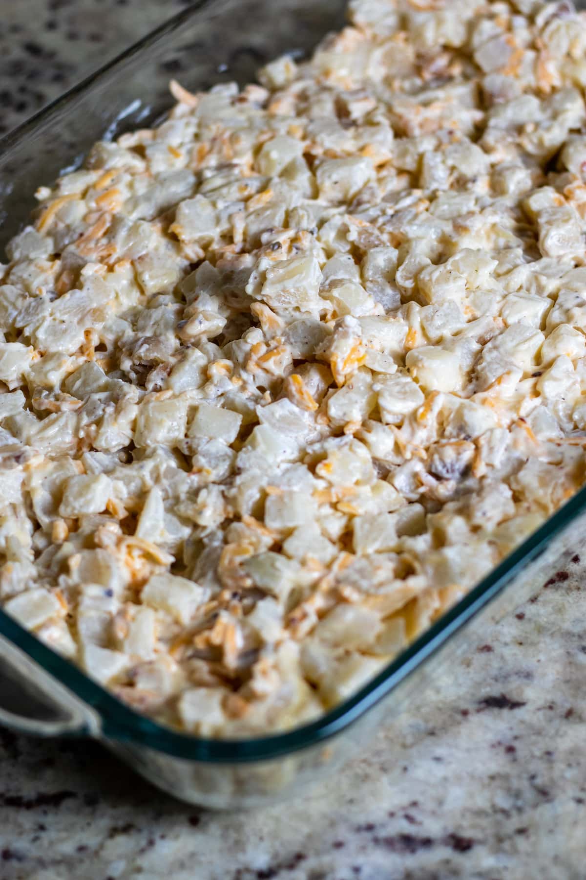 Potato mixture in casserole dish.