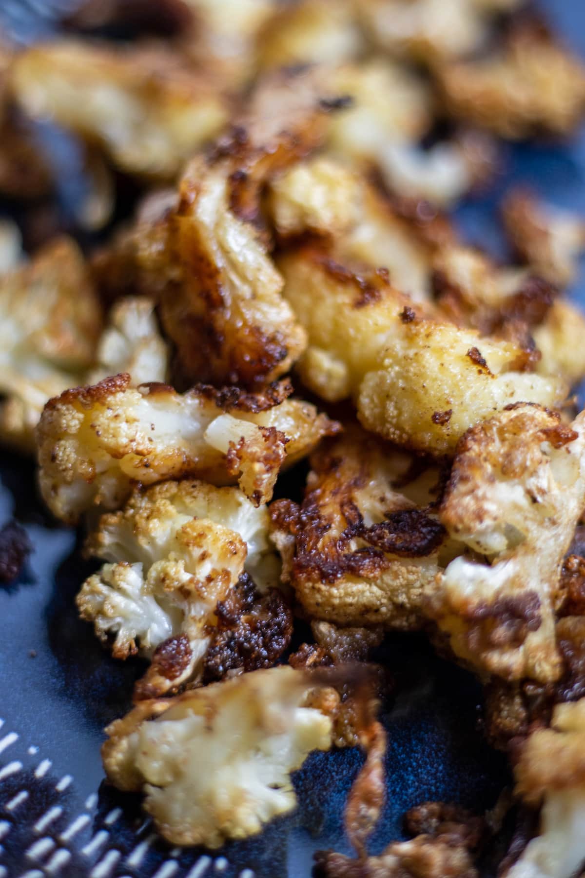 close up of roasted cauliflower on a plate